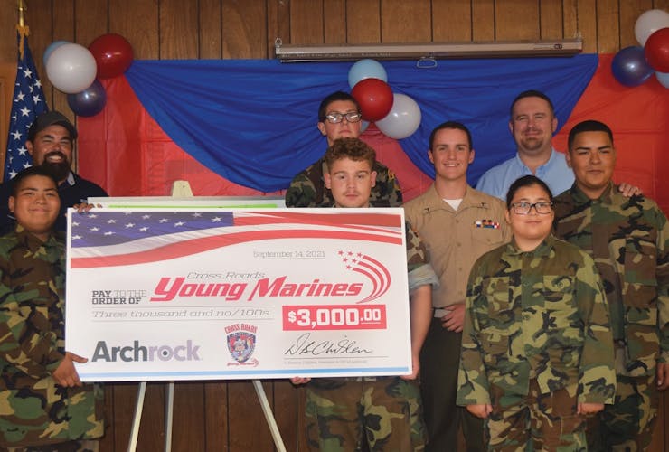 Archrock giving check to the Young Marines