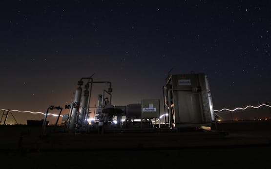 Electric ompression equipment with arcs of electricity in the background.